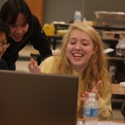 Students collaborating at an Open Source Comes to Campus event